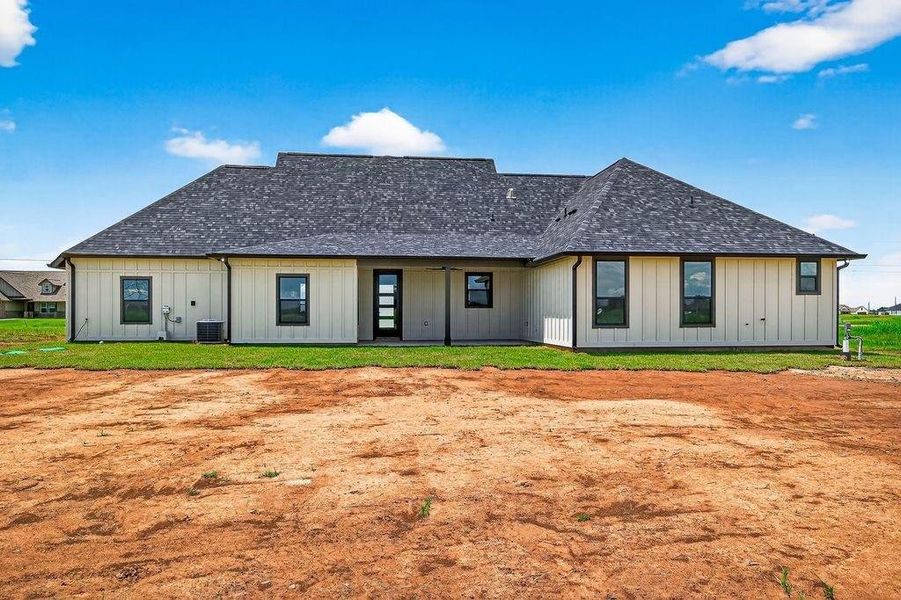 Front exterior of a new home in , Angleton, TX, highlighting curb appeal (Image 24).