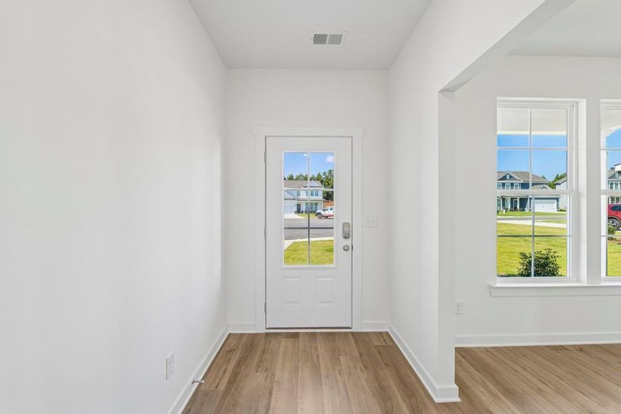 Spacious, unfurnished interior of a new home in Sutton’s Landing, Statham (Image 37).
