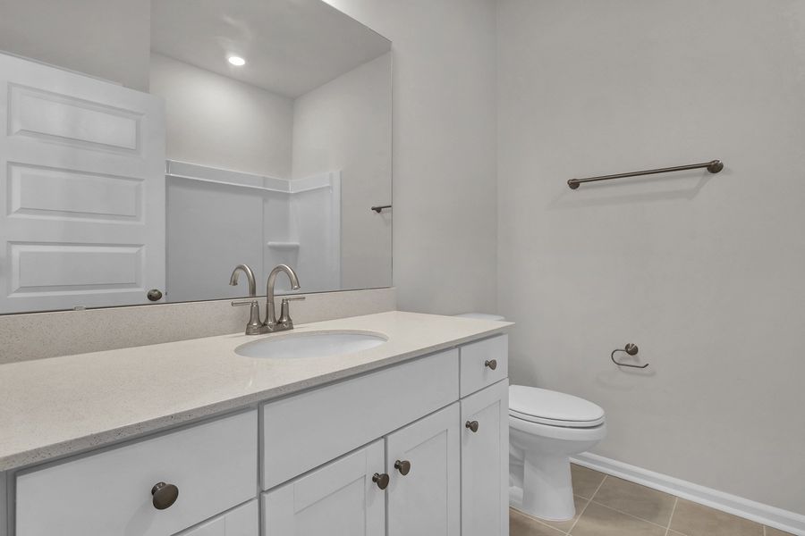 Furnished interior view inside a new home in Grand Park, Leland (Image 9).