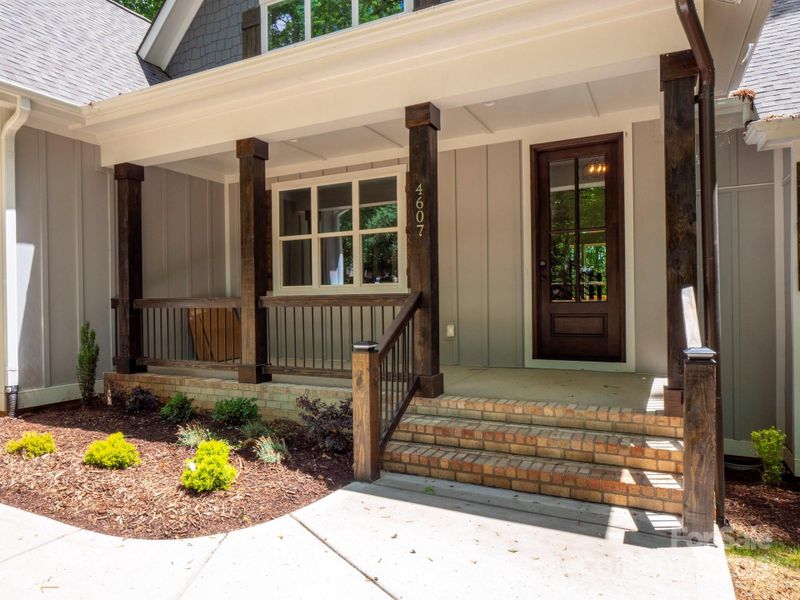 Front exterior of a new home in , Waxhaw, NC, highlighting curb appeal (Image 23).