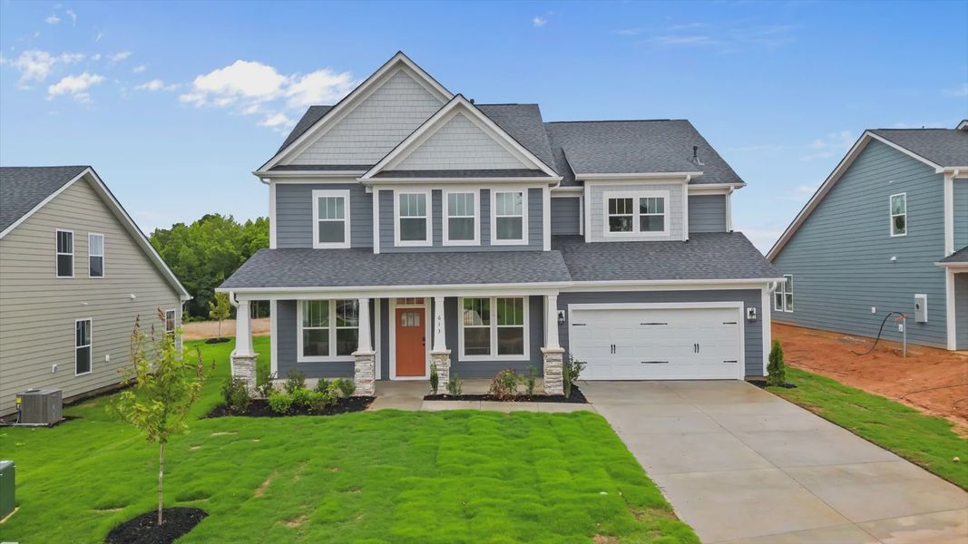 Representative exterior photo of a completed home built from the Stonehaven by DRB Homes in Pinebrook, Woodruff, SC (Image 21).