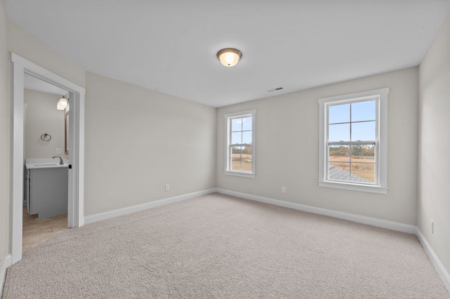 Spacious, unfurnished interior of a new home in Eli's Ridge, Winterville (Image 43).