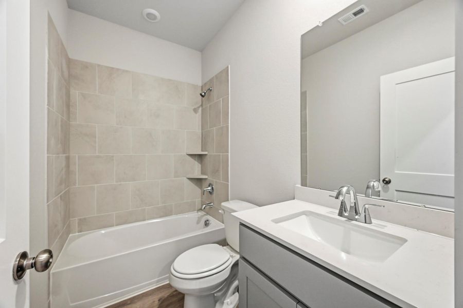 Furnished interior view inside a new home in Crockett Meadows, Conroe (Image 7).