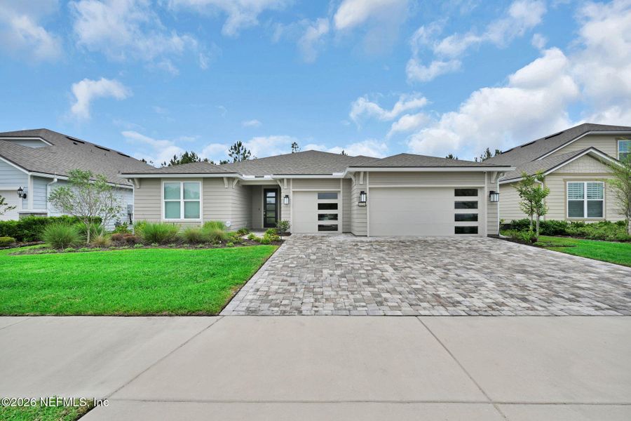 Front exterior of a new home in , Jacksonville, FL, highlighting curb appeal (Image 25).