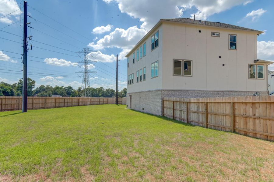 Front exterior of a new home in Townsen Landing, Humble, TX, highlighting curb appeal (Image 15).