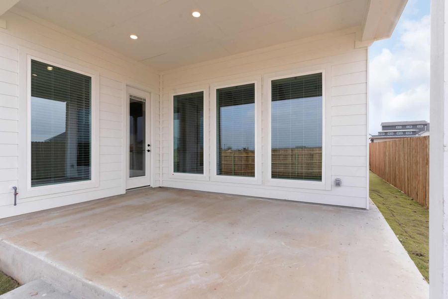 Exterior details and patio area of a home in The Grove at Blackhawk, Pflugerville (Image 20).
