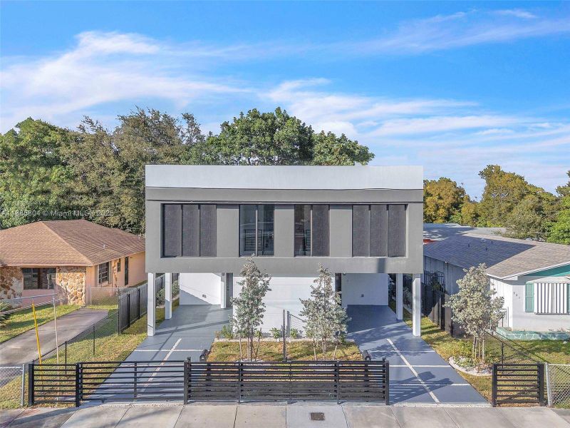 Front exterior of a new home in , Miami, FL, highlighting curb appeal (Image 30).