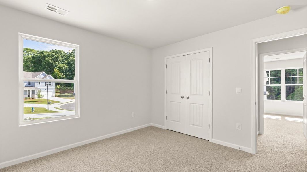 Representative unfurnished interior of a home built from the Halton by D.R. Horton in Liberty Crossing, Braselton (Image 29).