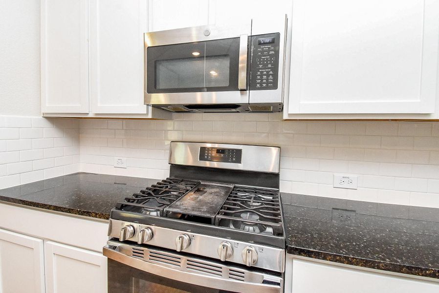 Stainless steel microwave and gas stove included. Stainless steel microwave and gas stove included.