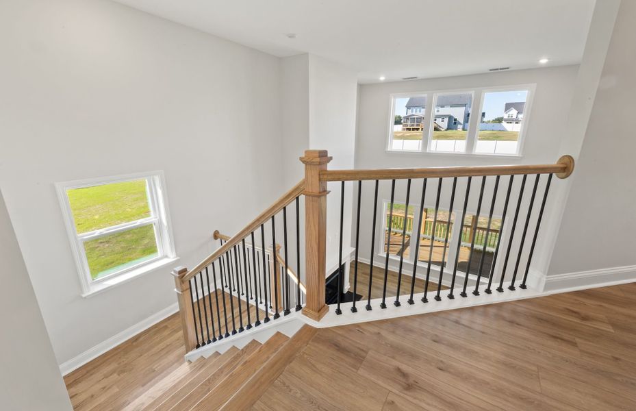 Spacious, unfurnished interior of a new home in Browning Stables, Wendell (Image 46).