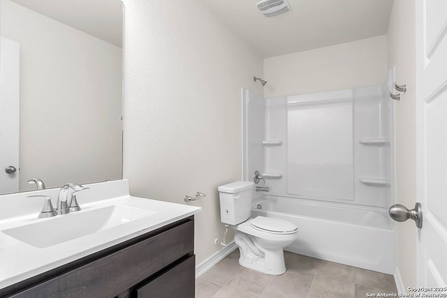 Furnished interior view inside a new home in Medina Crossing - Villa Collection, Von Ormy (Image 6).