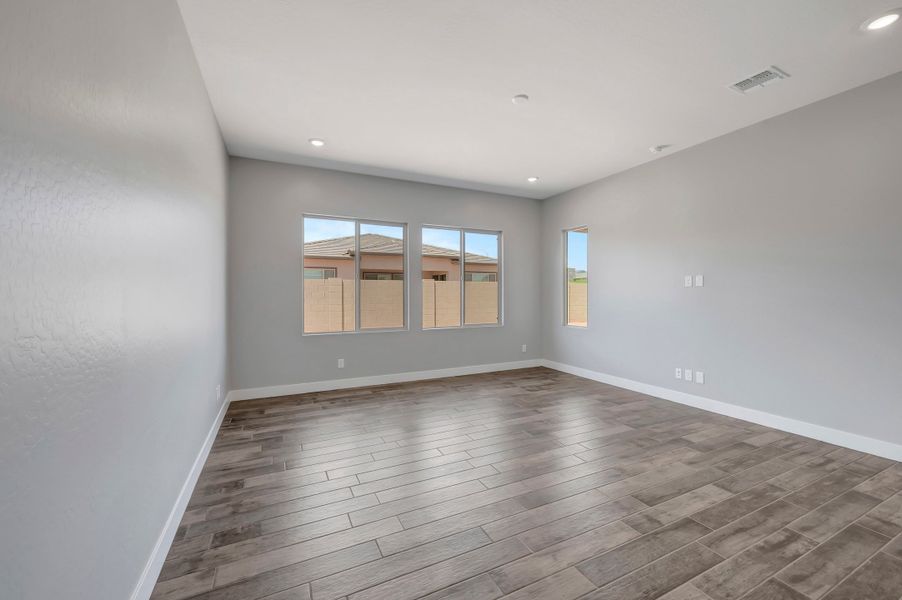 Spacious, unfurnished interior of a new home in Blossom Rock, Apache Junction (Image 38). Spacious, unfurnished interior of a new home in Blossom Rock, Apache Junction (Image 38).