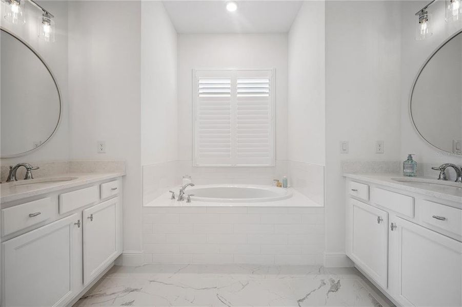 Furnished interior view inside a new home in Northlake at Ovation, Winter Garden (Image 32).