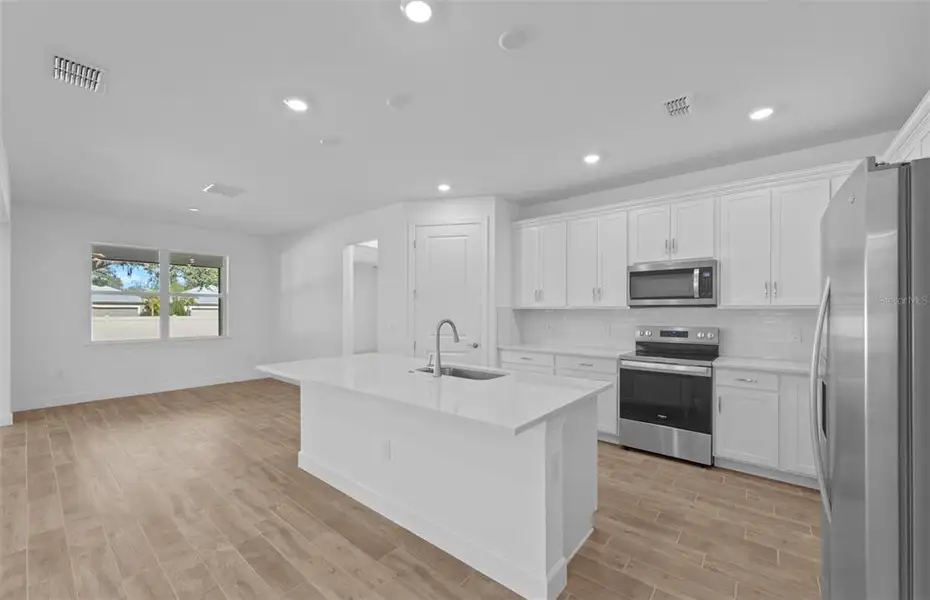 Furnished interior view inside a new home in Legacy Groves, Nokomis (Image 9).