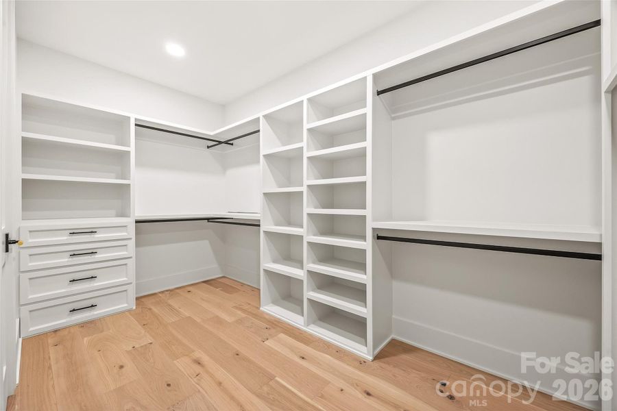 Primary walk-in-closet Primary walk-in-closet