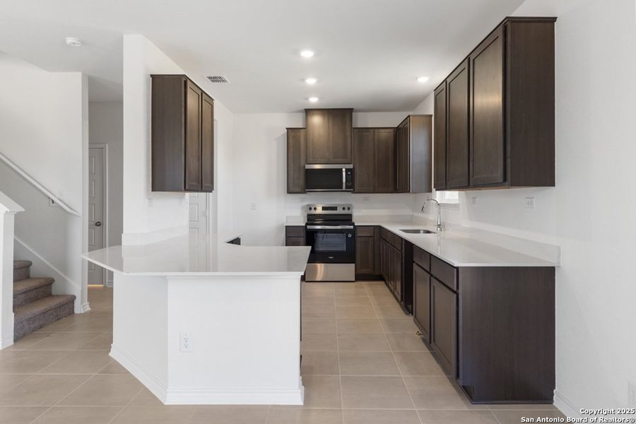 Furnished interior view inside a new home in The Granary - Heritage Collection, San Antonio (Image 6). Furnished interior view inside a new home in The Granary - Heritage Collection, San Antonio (Image 6).