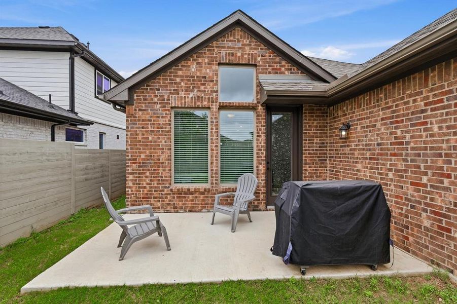 Exterior details and patio area of a home in Harvest, Argyle (Image 25).