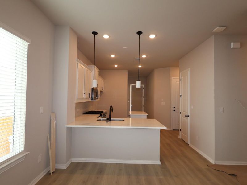 Furnished interior view inside a new home in Heritage, Dripping Springs (Image 5).