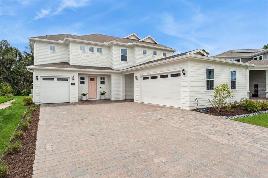 Front exterior of a new home in , St. Cloud, FL, highlighting curb appeal (Image 23).