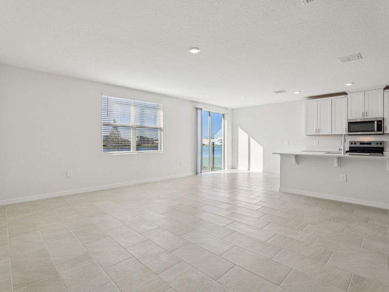 Spacious, unfurnished interior of a new home in Lake Deer Estates - Signature Series, Poinciana (Image 9).