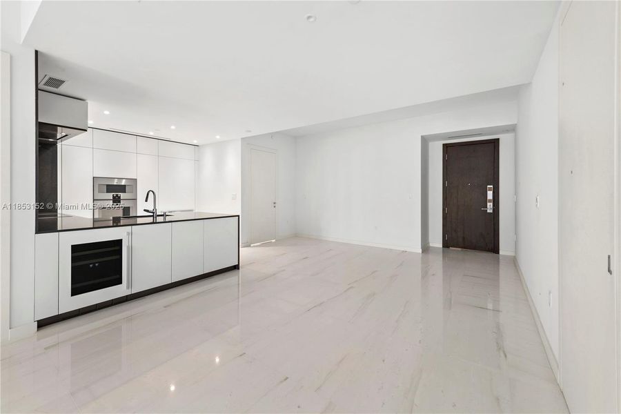 Spacious, unfurnished interior of a new home in Aston Martin Residences, Miami (Image 21).