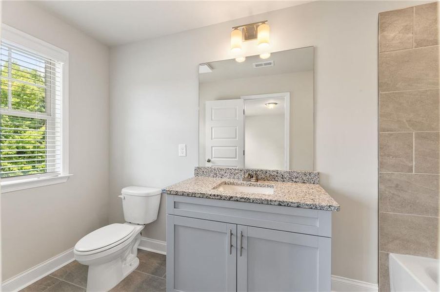 Furnished interior view inside a new home in Towns at Enclave, Lawrenceville (Image 12).