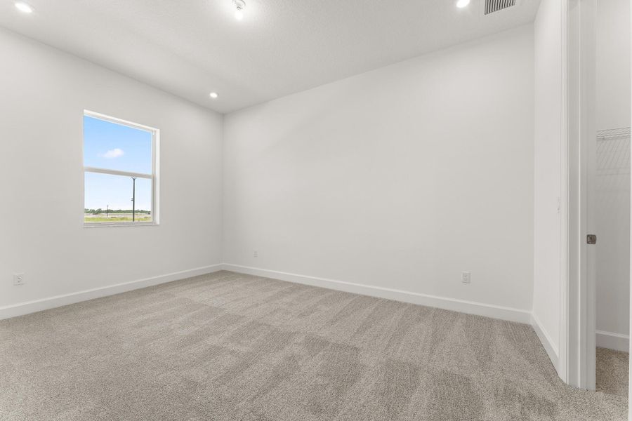 Spacious, unfurnished interior of a new home in Tradition - Seville, Port St. Lucie (Image 11).