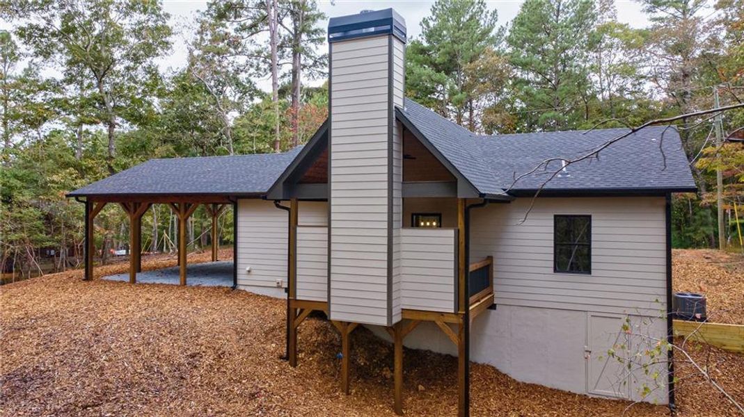 Exterior details and patio area of a home in , Ellijay (Image 26).