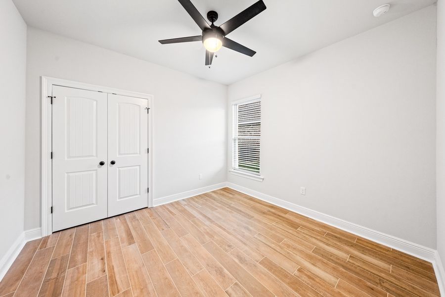 Spacious, unfurnished interior of a new home in Bird Song at Hammock Bay, Freeport (Image 19).