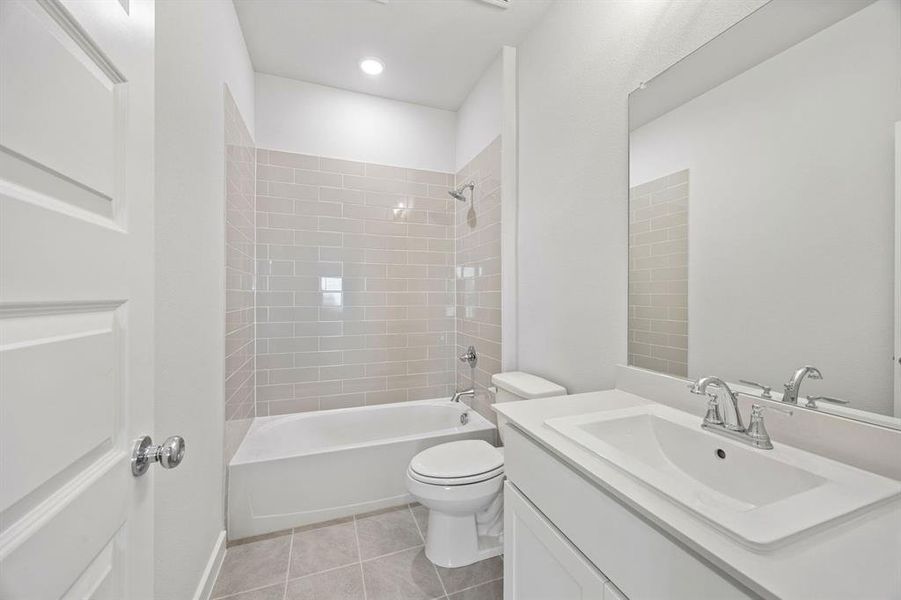 Bathroom in the Wimbledon home plan by Trophy Signature Homes – REPRESENTATIVE PHOTO
