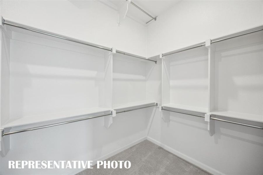 Featuring 3rd row seasonal hanging and tons of space, your dream closet awaits!  REPRESENTATIVE PHOTO
