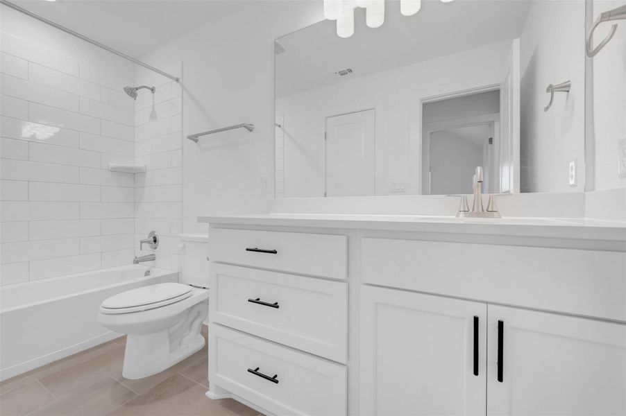 Furnished interior view inside a new home in Edgewood, Leander (Image 12). Furnished interior view inside a new home in Edgewood, Leander (Image 12).