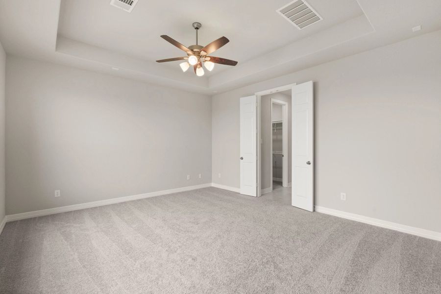 Primary bedroom. Sample product photo. Actual exterior and interior selections may vary by homesite. Photo may be virtually staged.