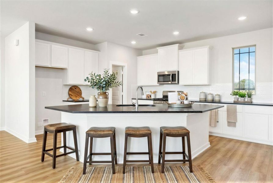 Virtually staged representation of Kitchen.