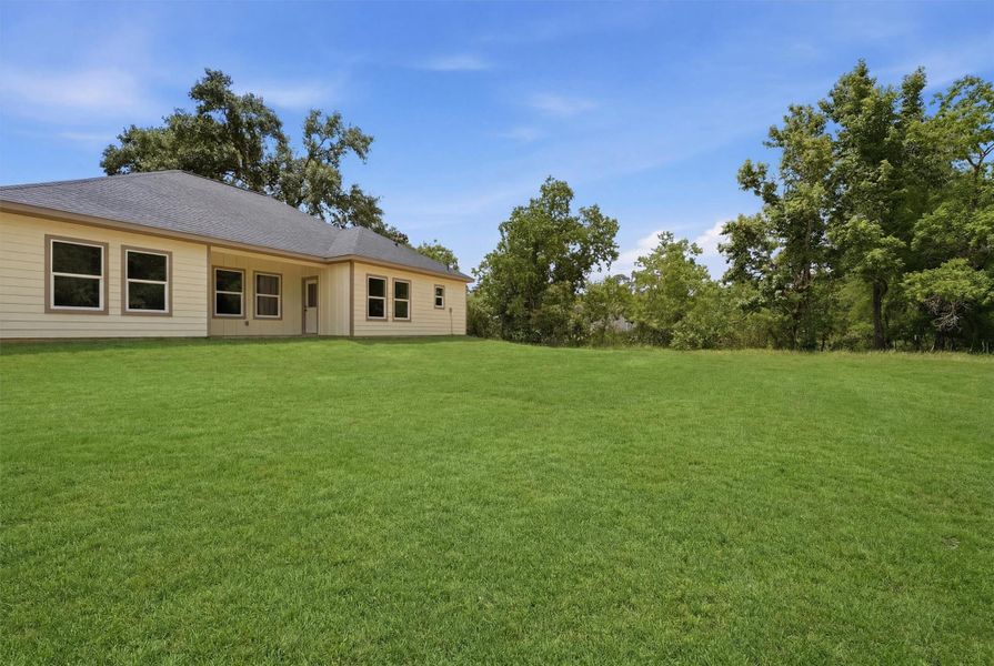 Exterior details and patio area of a home in , Conroe (Image 19).