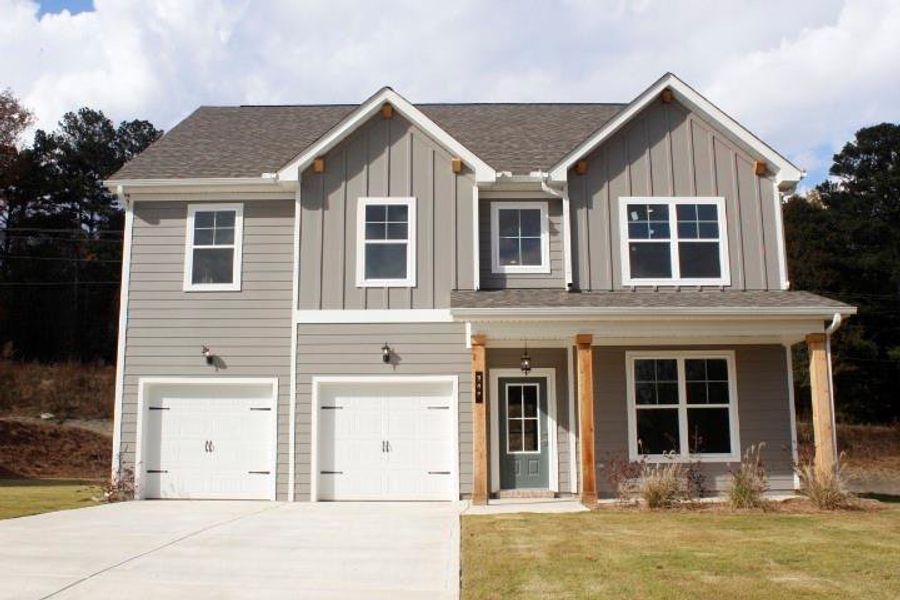 Front exterior of a new home in , Commerce, GA, highlighting curb appeal (Image 1).