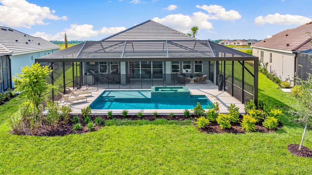 Representative exterior photo of a completed home built from the Marino by Taylor Morrison in Esplanade at McKinnon Groves, Winter Garden, FL (Image 21).