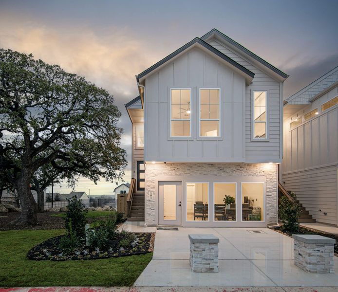 Front exterior of a new home in Santa Rita Ranch, Liberty Hill, TX, highlighting curb appeal (Image 2). Front exterior of a new home in Santa Rita Ranch, Liberty Hill, TX, highlighting curb appeal (Image 2).