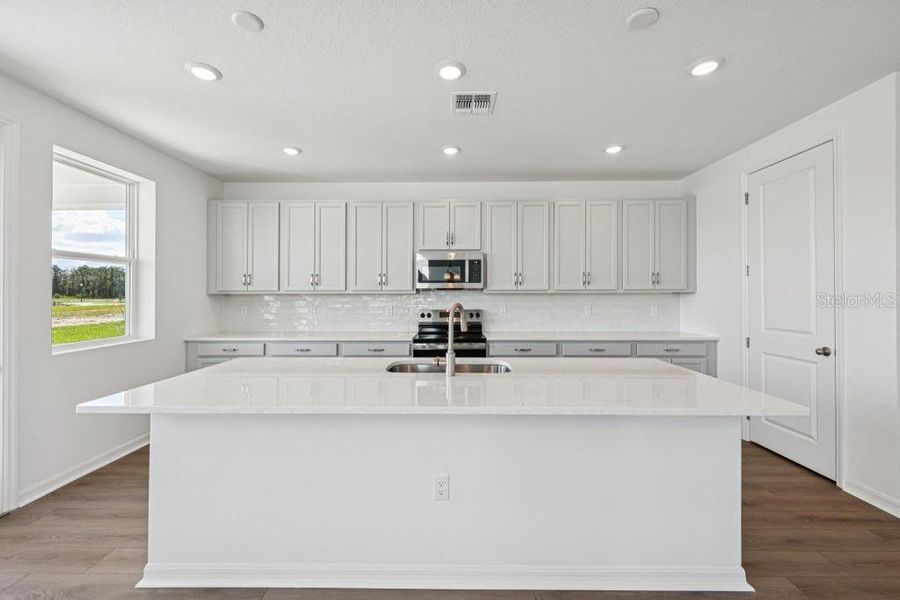 Furnished interior view inside a new home in Northlake at Ovation, Winter Garden (Image 8). Furnished interior view inside a new home in Northlake at Ovation, Winter Garden (Image 8).