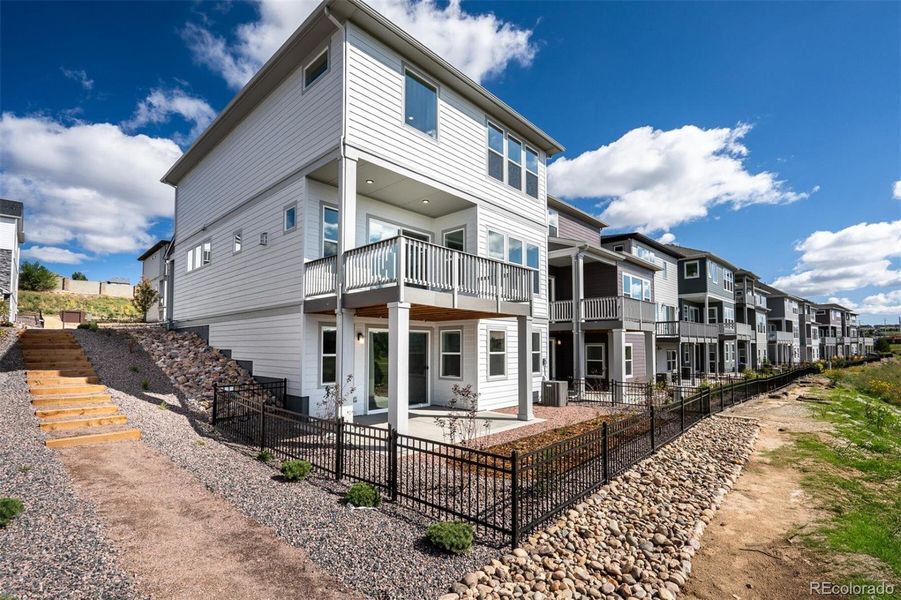 Exterior details and patio area of a home in Trailside at Cottonwood Creek, Colorado Springs (Image 21).