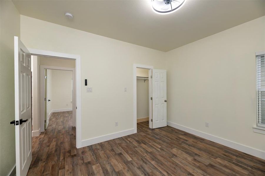 3rd bedroom with luxury vinyl and no carpet.