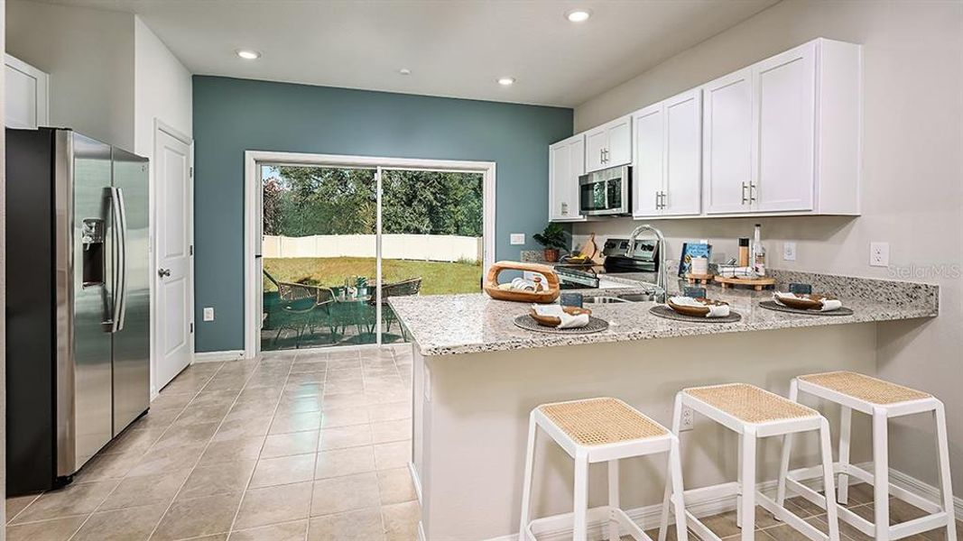 Furnished interior view inside a new home in Southloch, Mount Dora (Image 6).