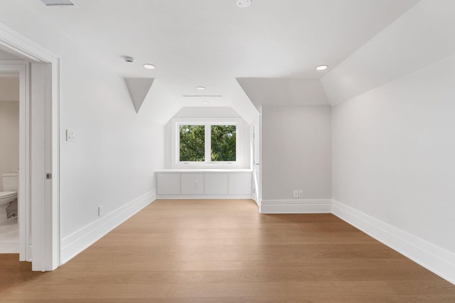 Guest bedroom with cozy reading nook.