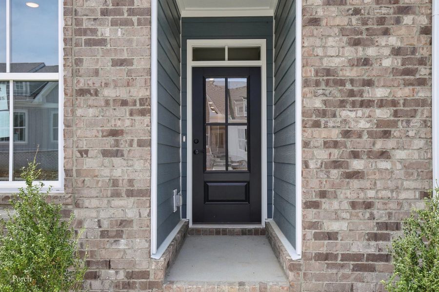 Exterior details and patio area of a home in Cedars of Cane Ridge | 55+ Community, Antioch (Image 3).