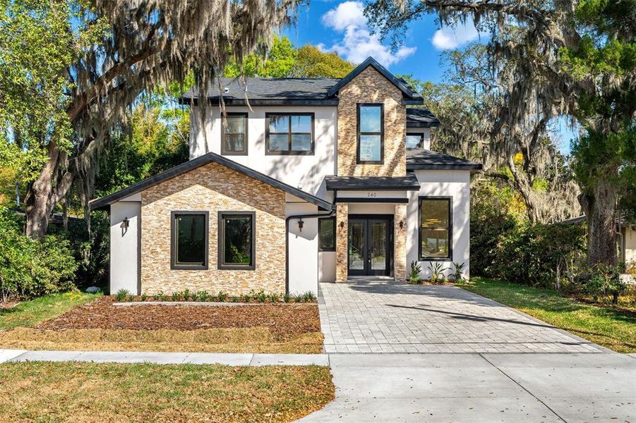Front exterior of a new home in , Winter Park, FL, highlighting curb appeal (Image 31).