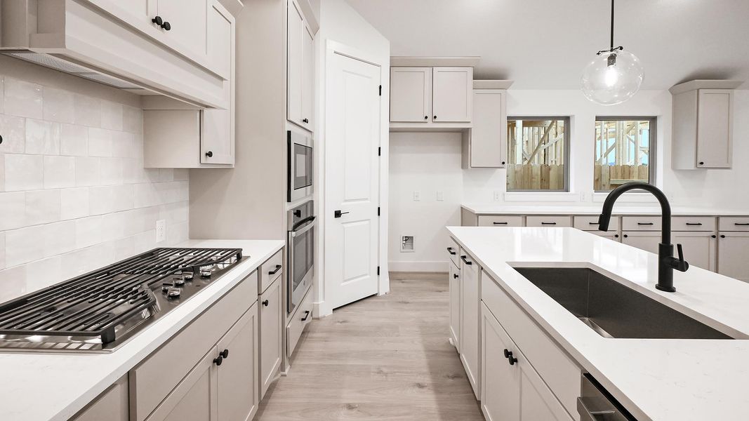 Furnished interior view inside a new home in Crosswinds, Kyle (Image 11).