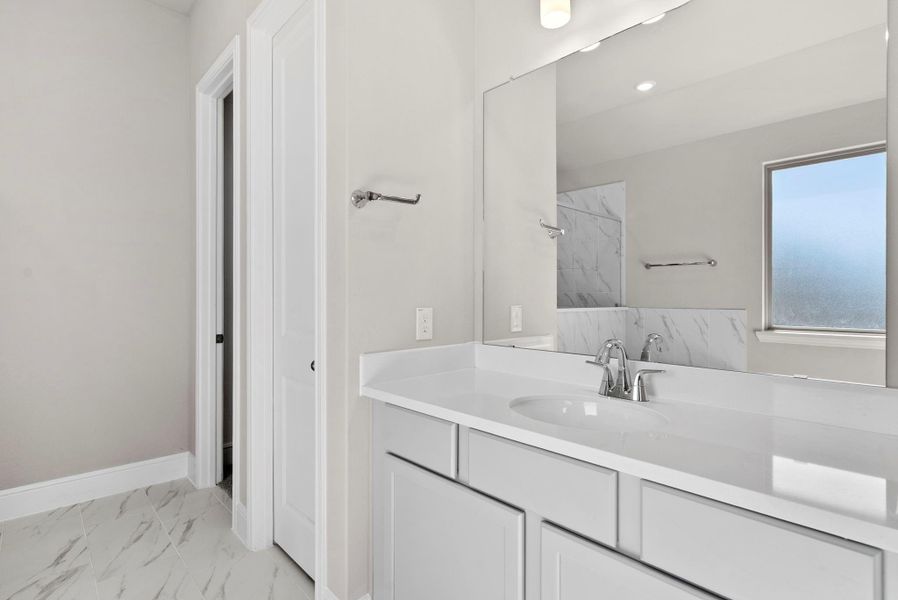 Furnished interior view inside a new home in Coastal Point, League City (Image 11).