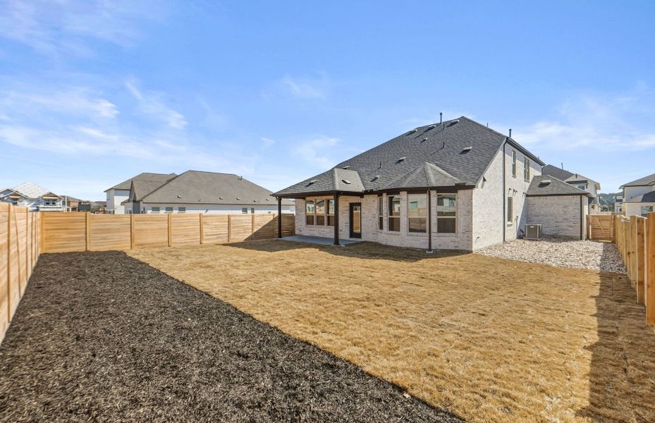 Exterior details and patio area of a home in Bluffview Reserve, Leander (Image 26).