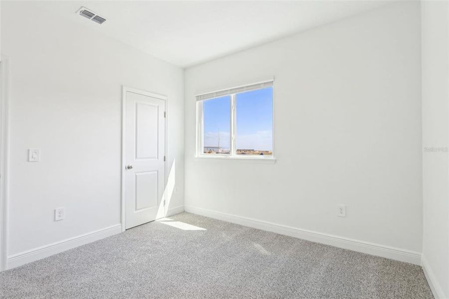 Spacious, unfurnished interior of a new home in Cyrene at Minneola - Villas, Minneola (Image 30).