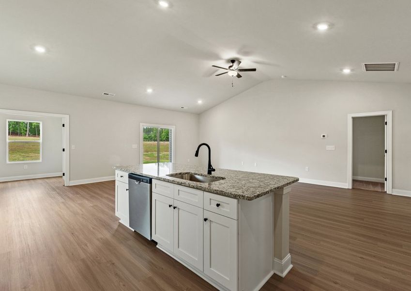 The kitchen overlooks the dining area